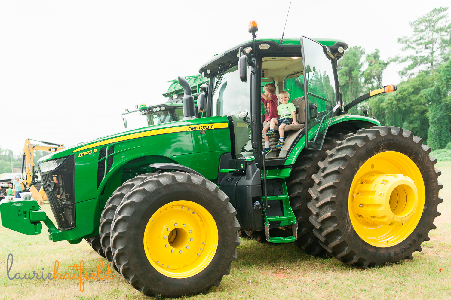 2 boys sitting in tractor | Huntsville AL family photographer