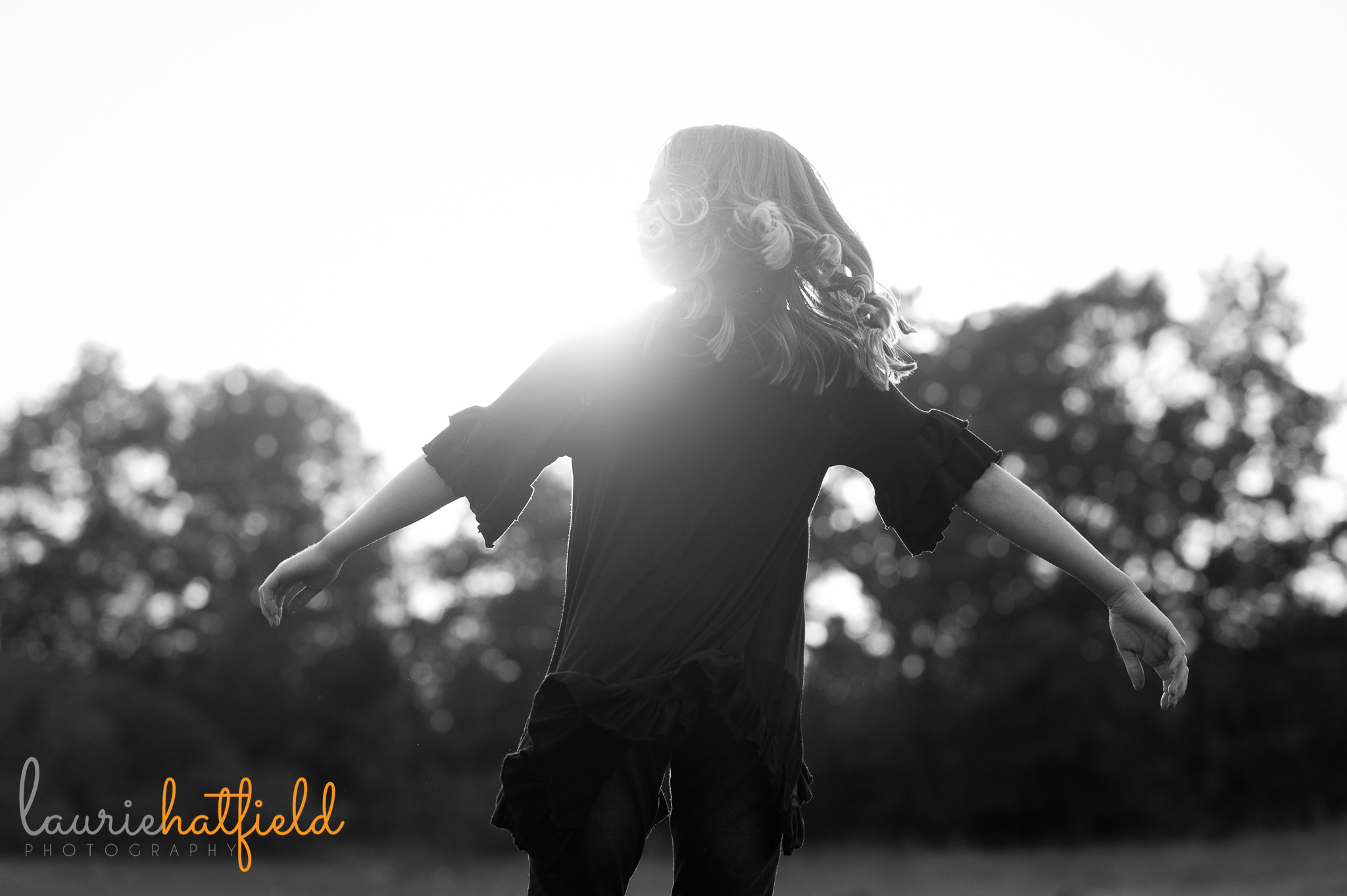 girl dancing in field | Mobile AL family photographer