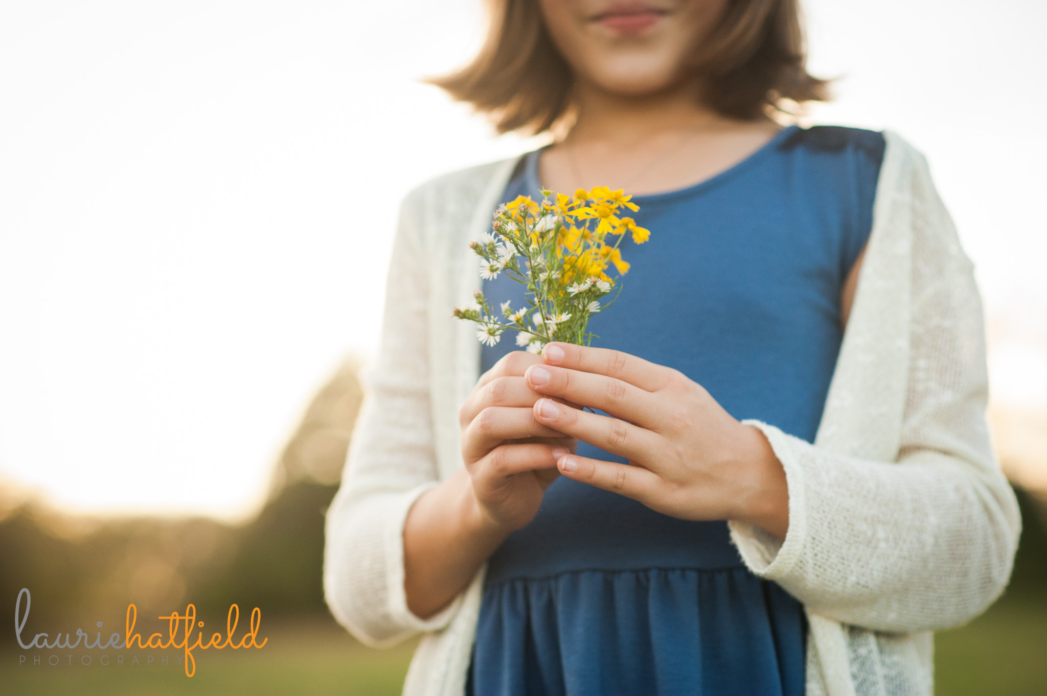 girl in blue dress holding yellow flower | Mobile family photographer
