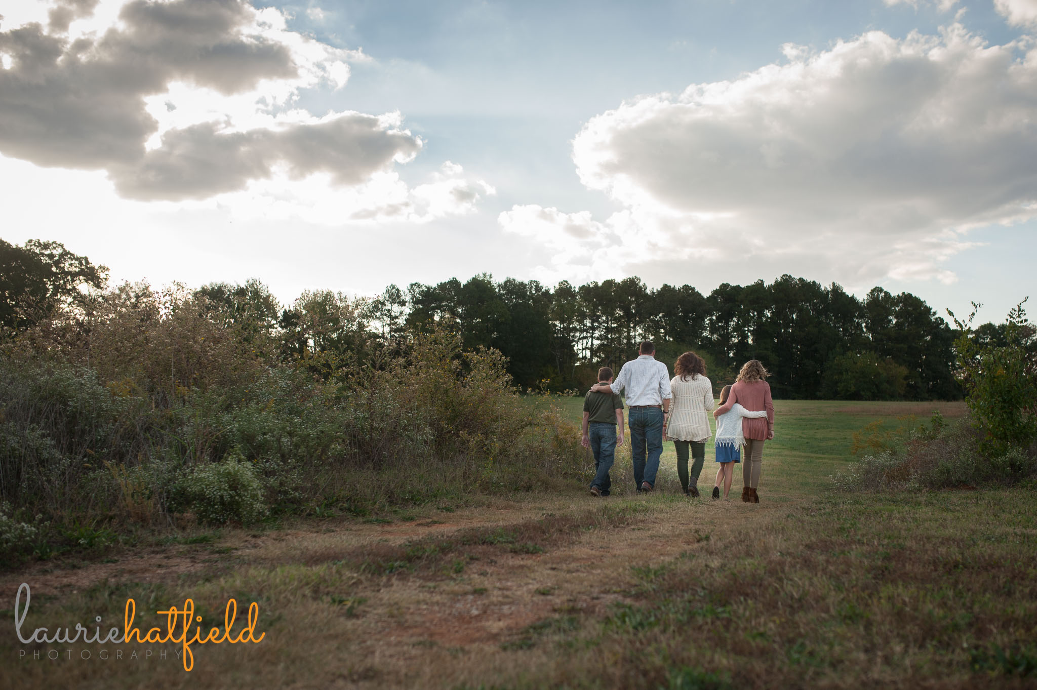 family of 5 walking in a field | Mobile AL photographer