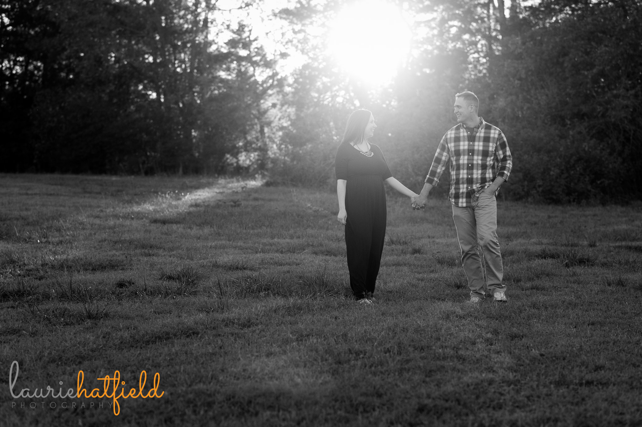couple walking in field | Mobile Al lifestyle photographer