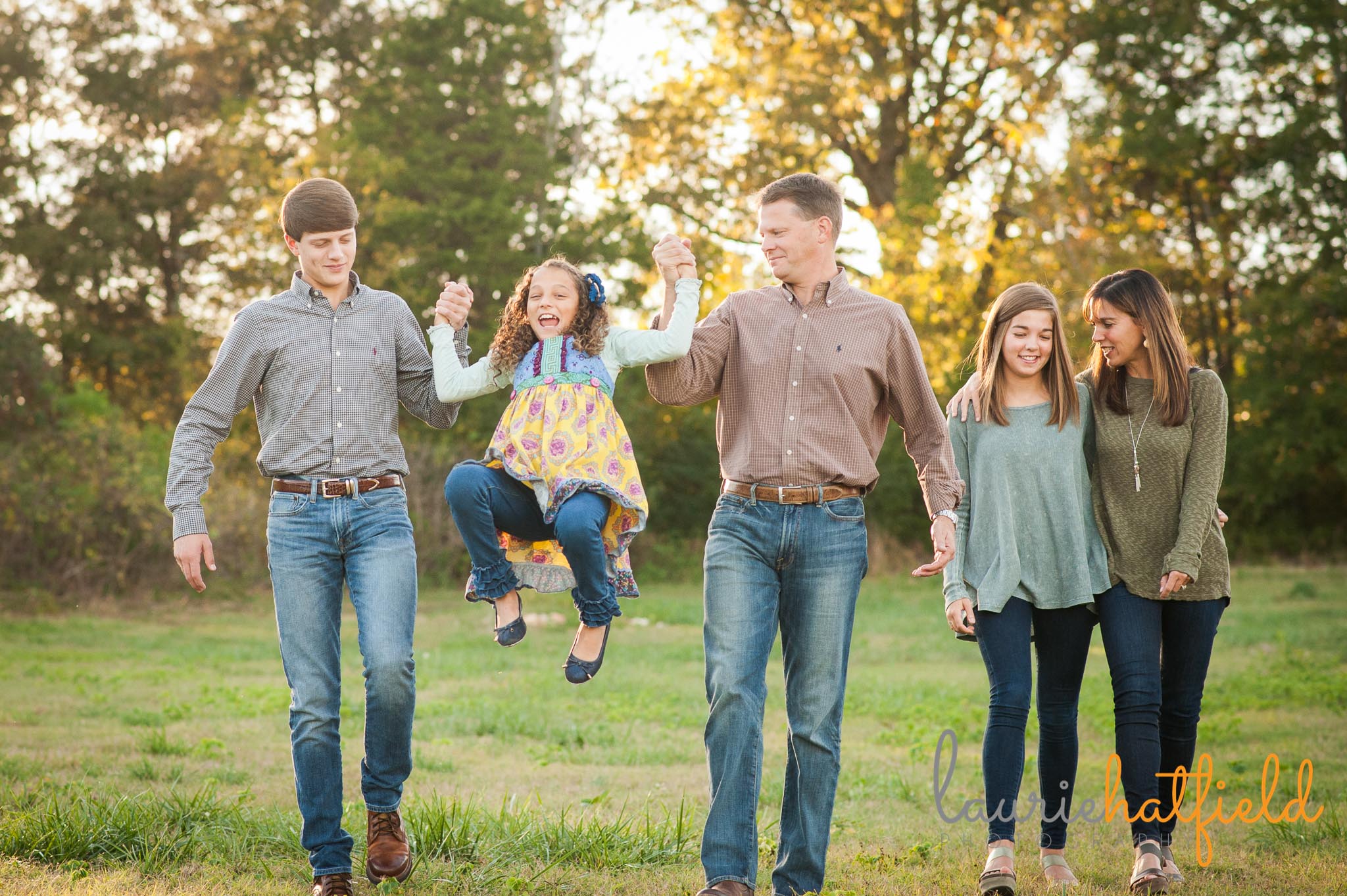 family of five walking through a field | Mobile AL photographer