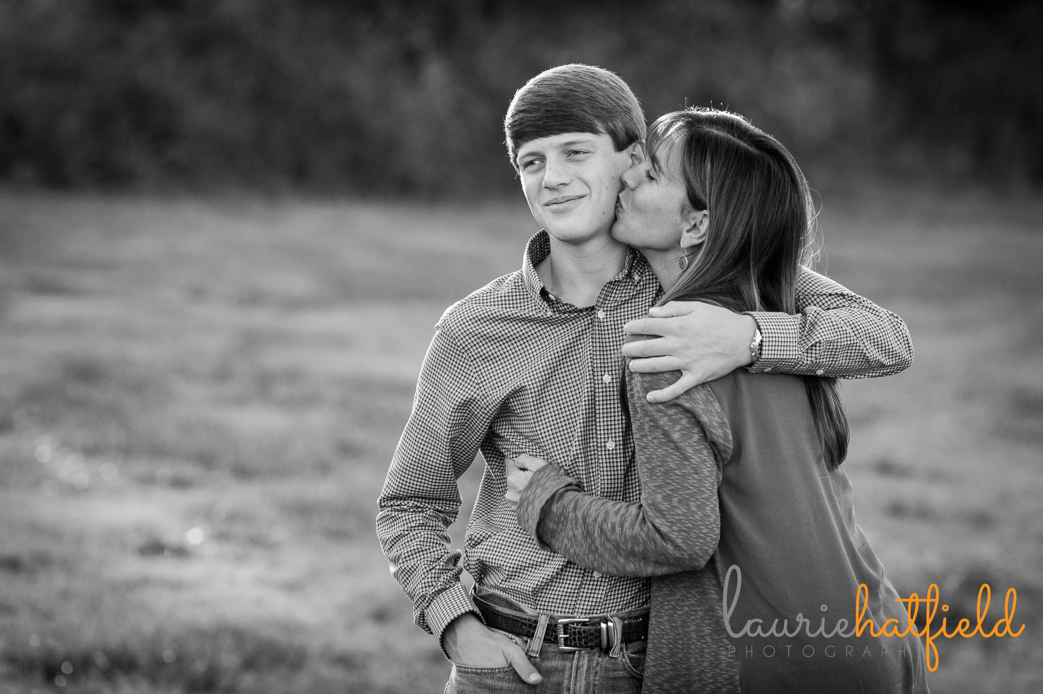 mother kissing teenage son | Mobile AL senior photographer
