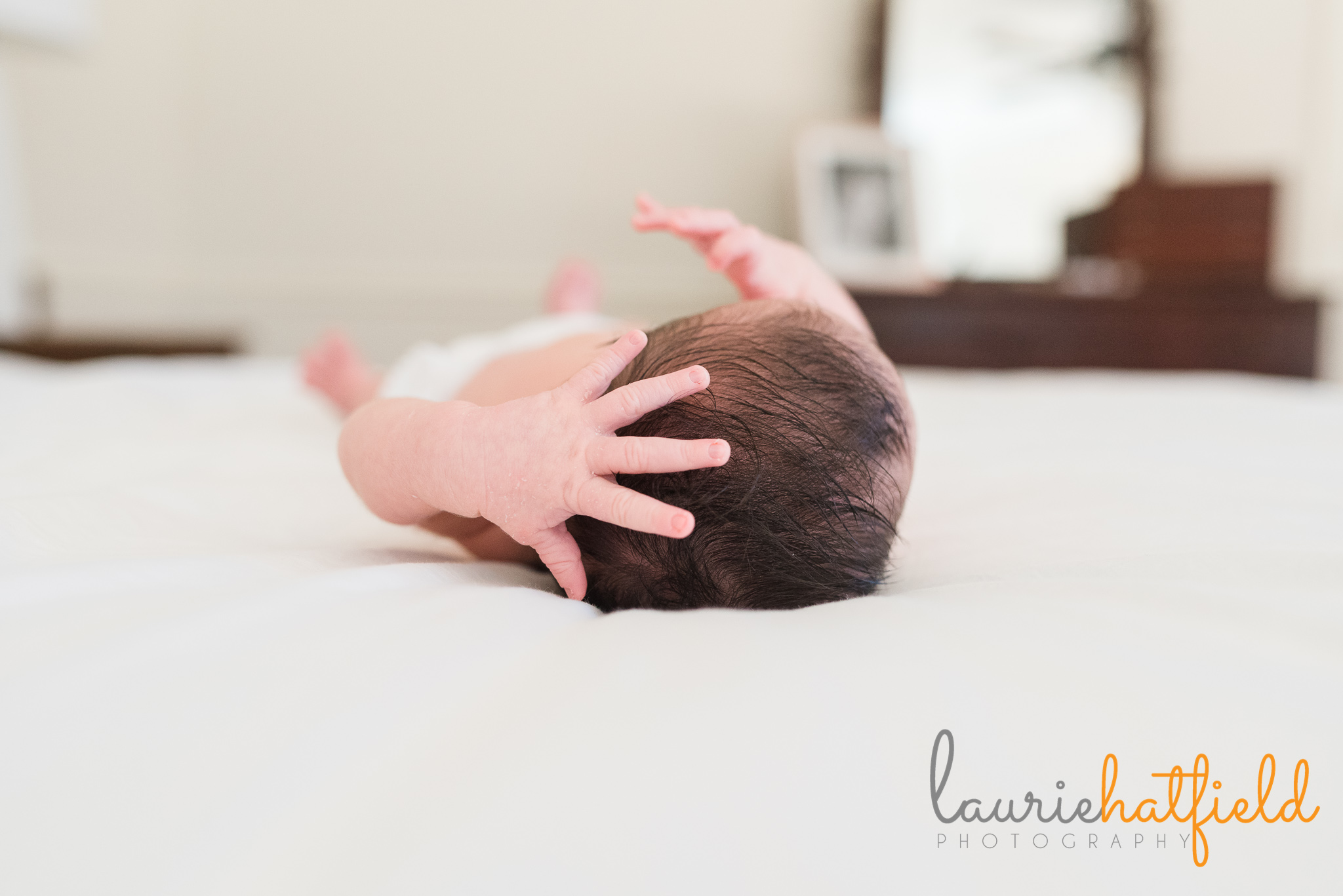 baby boy with dark hair | Mobile AL newborn photographer