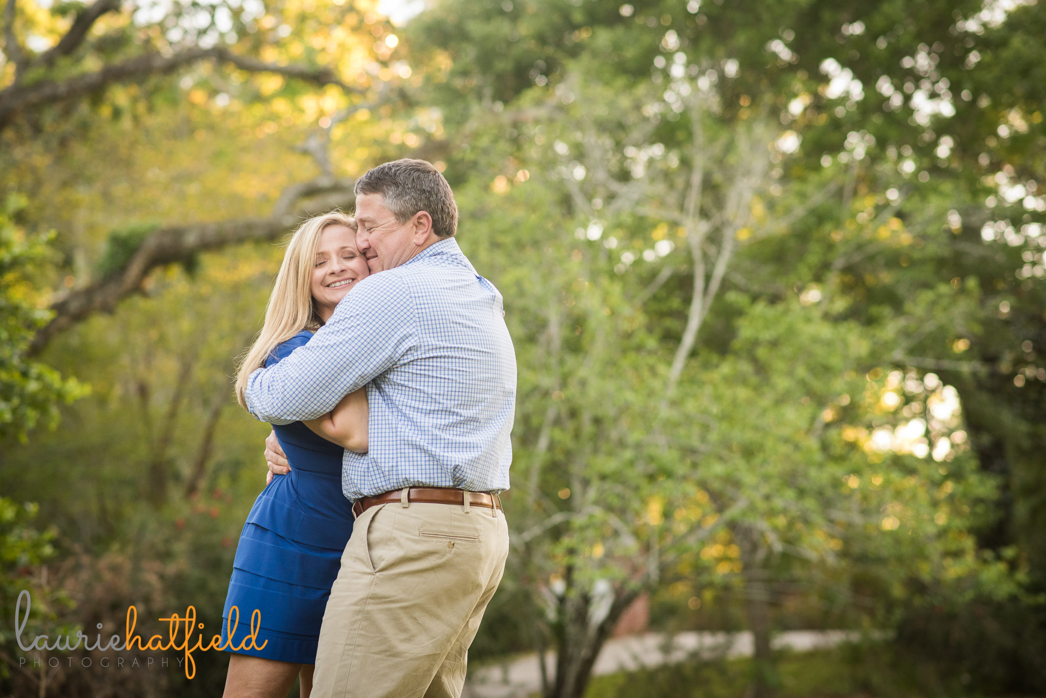 couple hugging by Mobile AL family photographer Laurie Hatfield Photography 