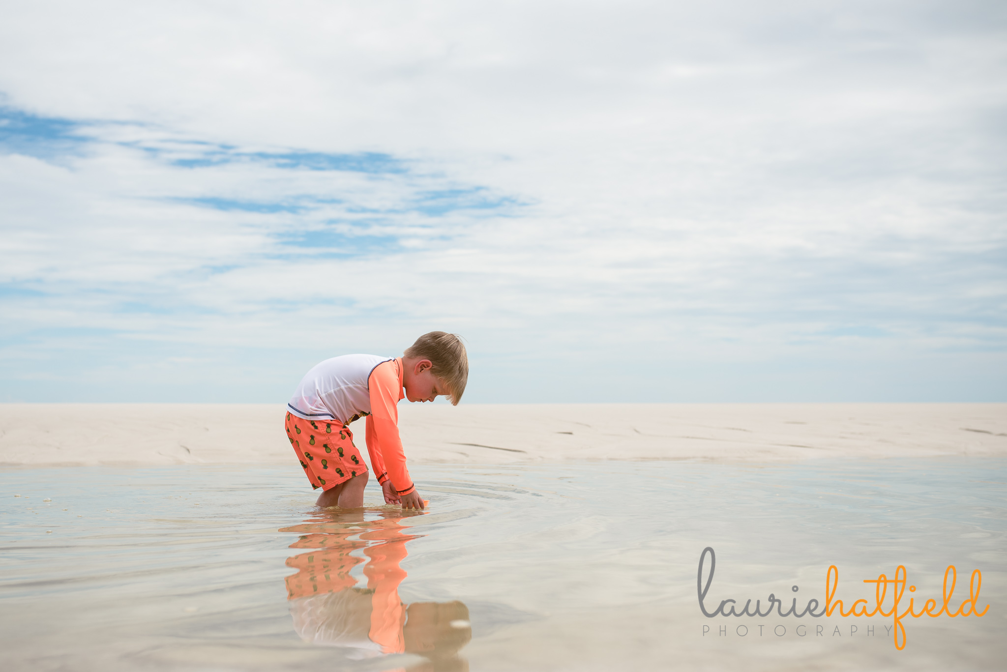 little boy playing on the beach | Mobile AL family photographer