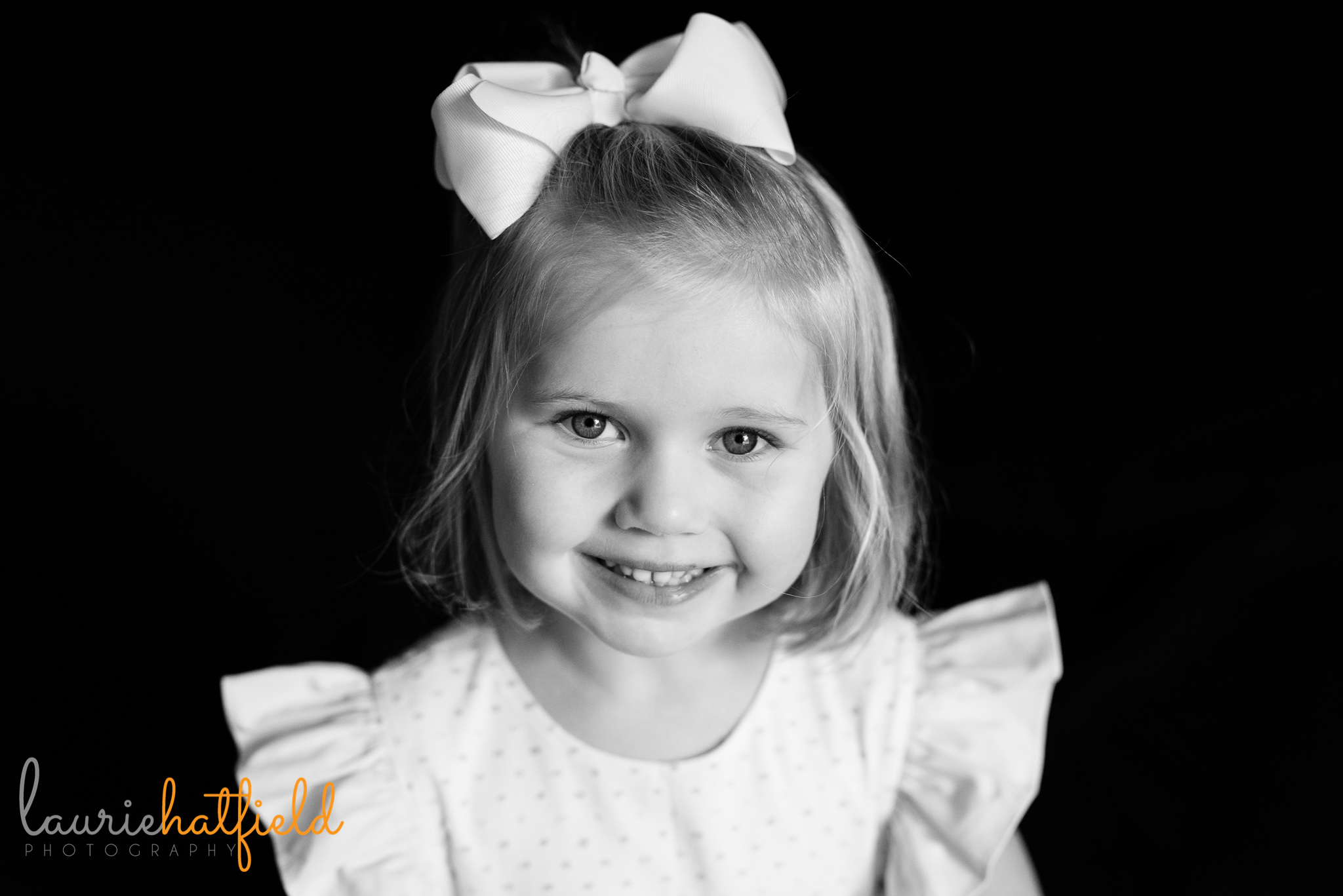 4-year-old girl smiling | Mobile AL school portrait photographer