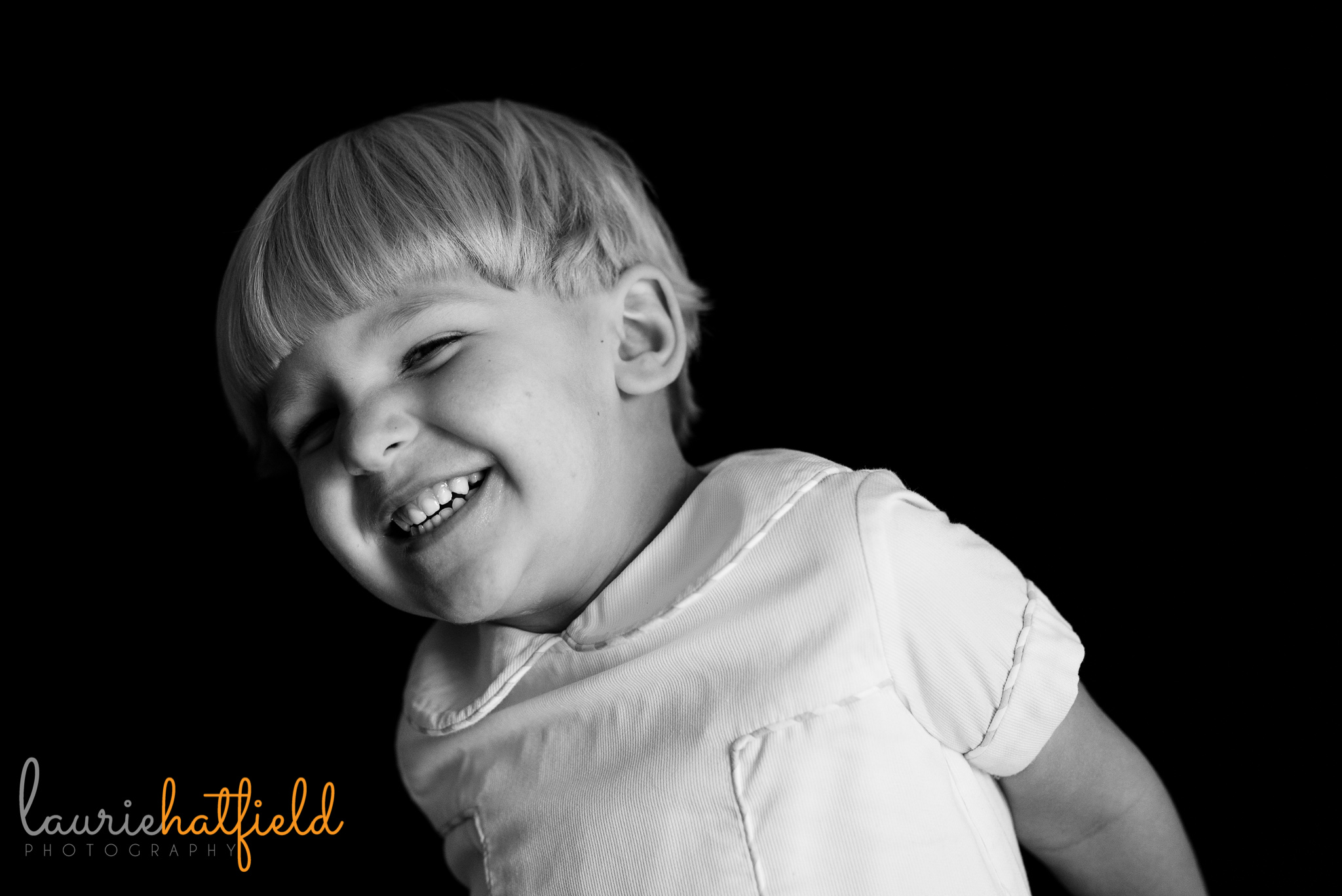 little boy laughing | Mobile AL preschool portraits