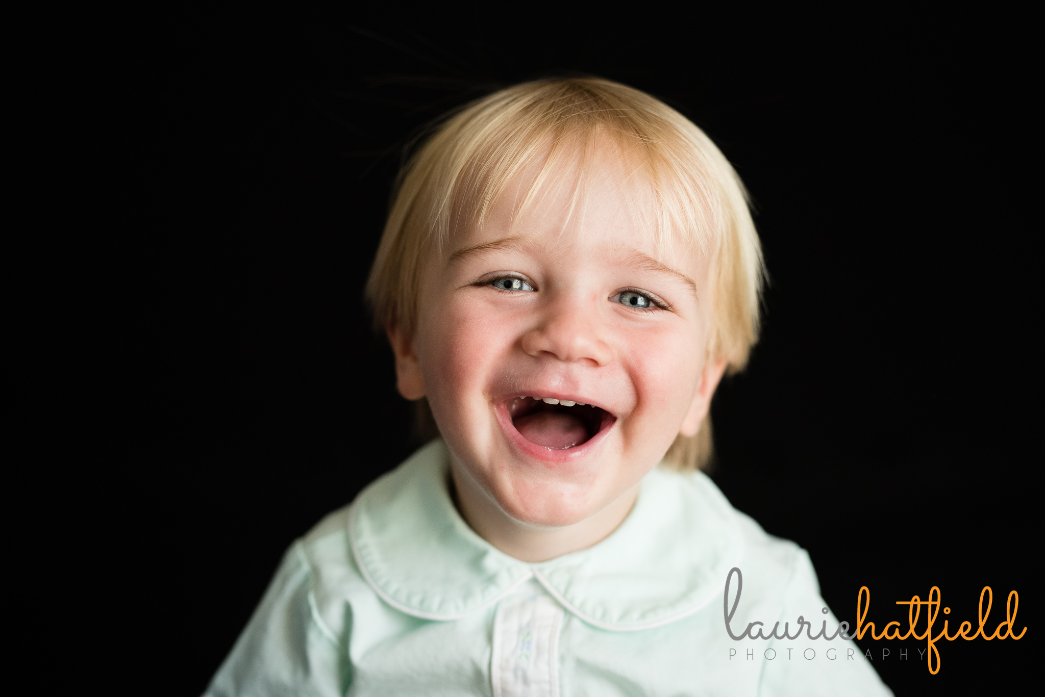 blond little boy laughing | Mobile AL preschool phtographer