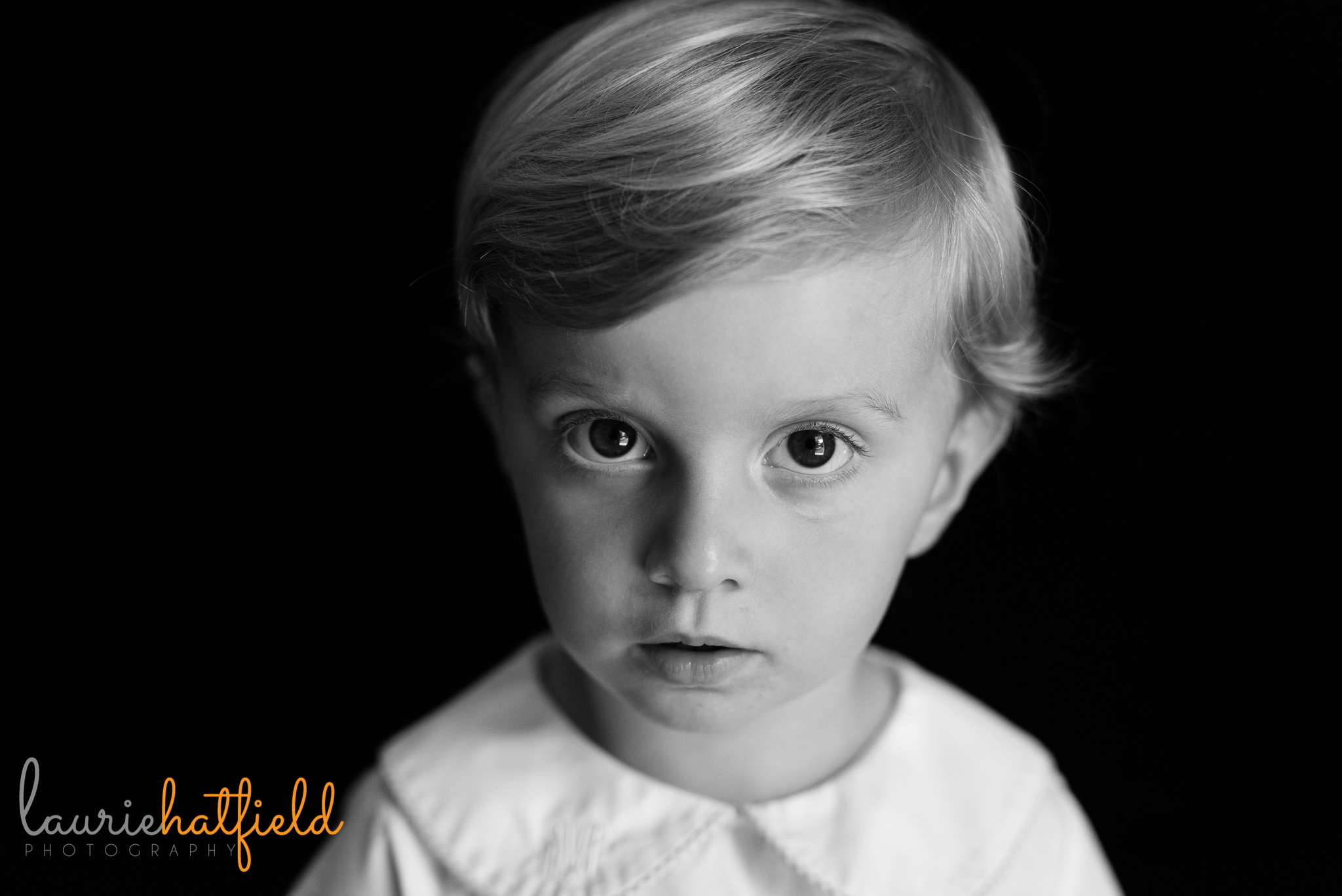 little boy looking at camera | Mobile AL preschool portrait photographer