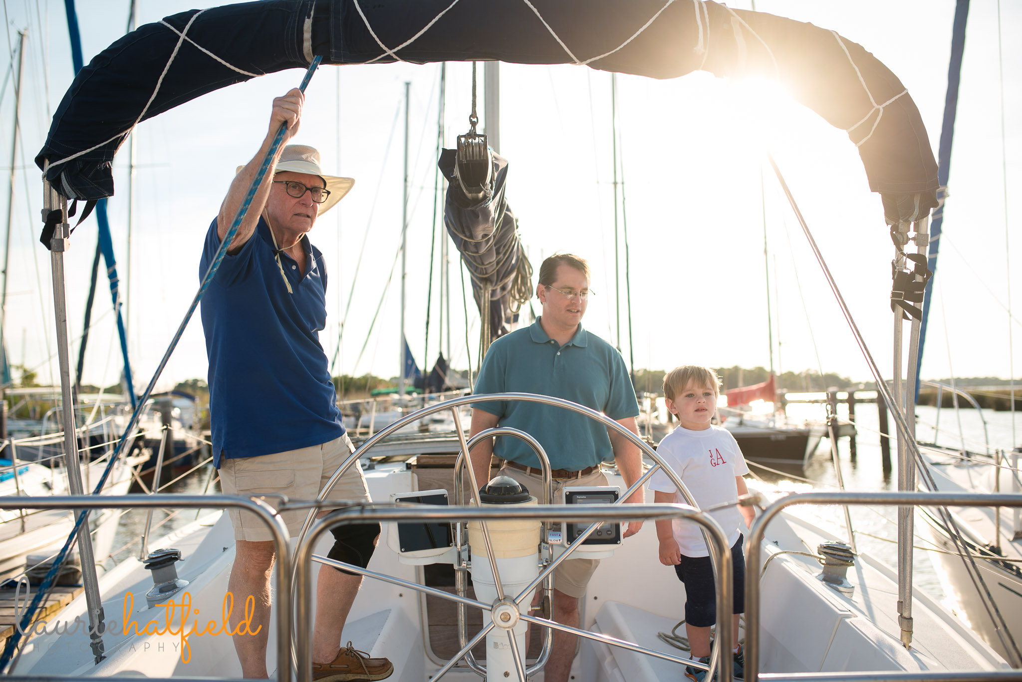 3 generations on sailboat | Mobile Al family photographer