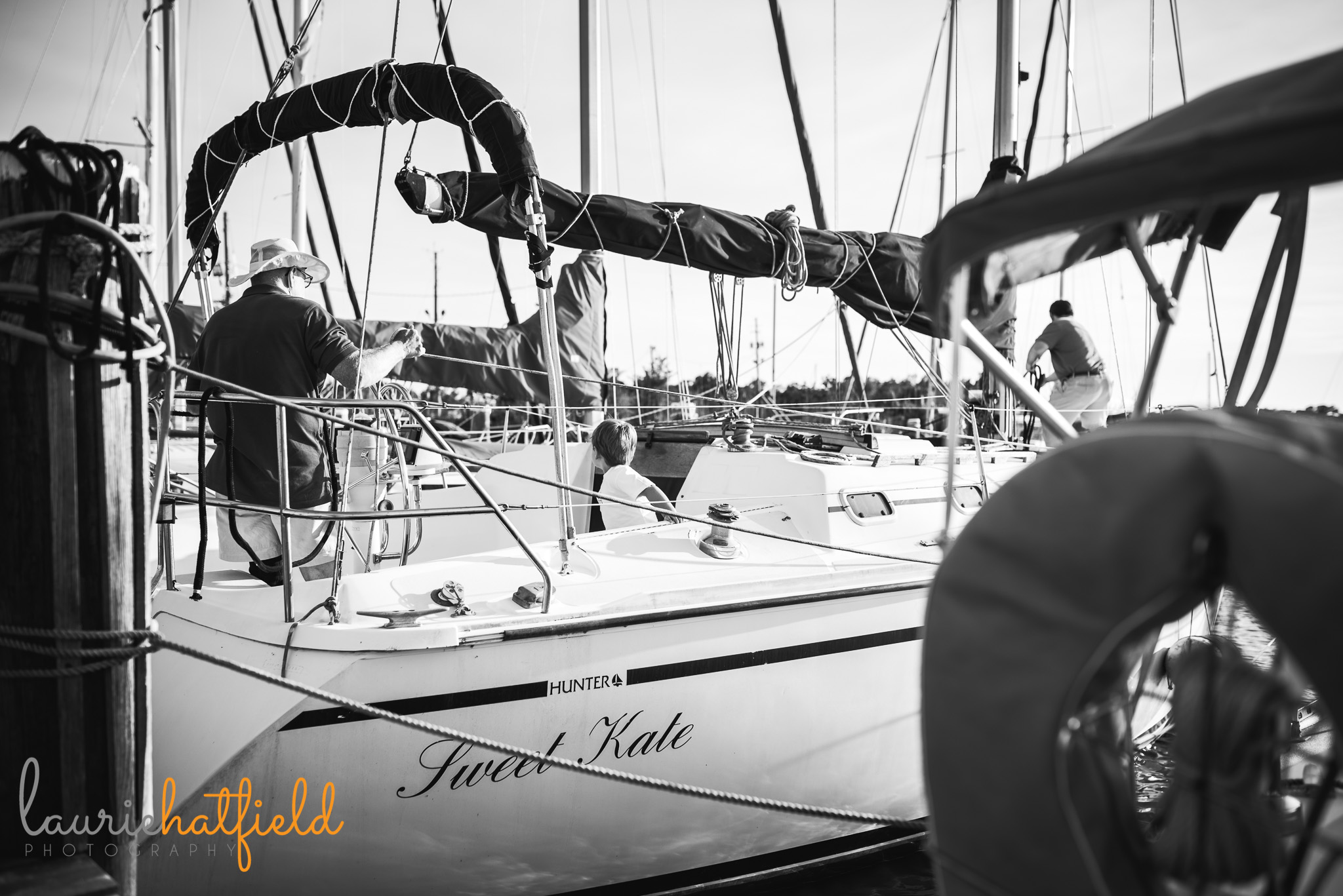 little boy on boat with dad and grandfather | Mobile AL lifestyle family photographer