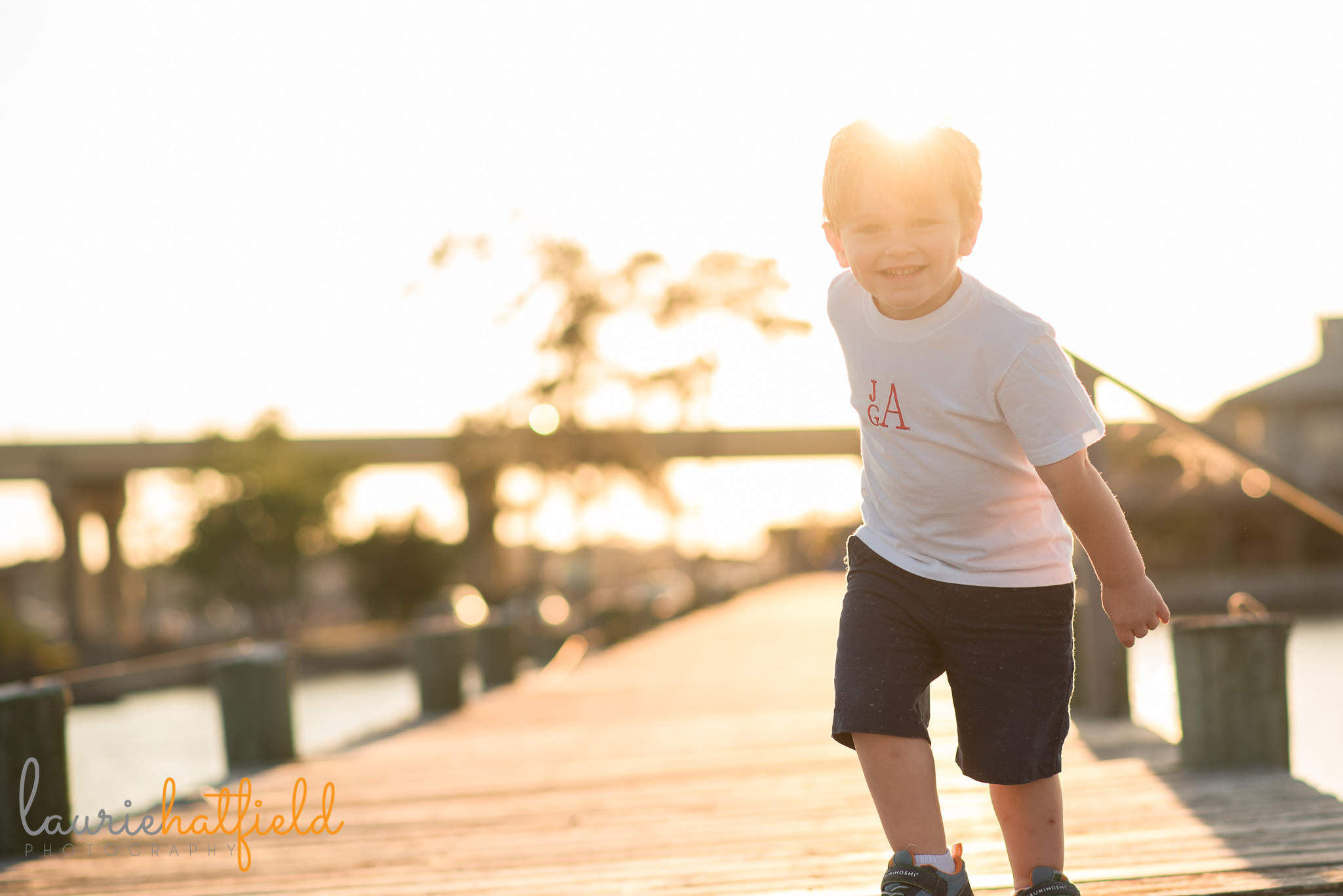 3-year-old little boy playing on pier | Mobile AL family photographer