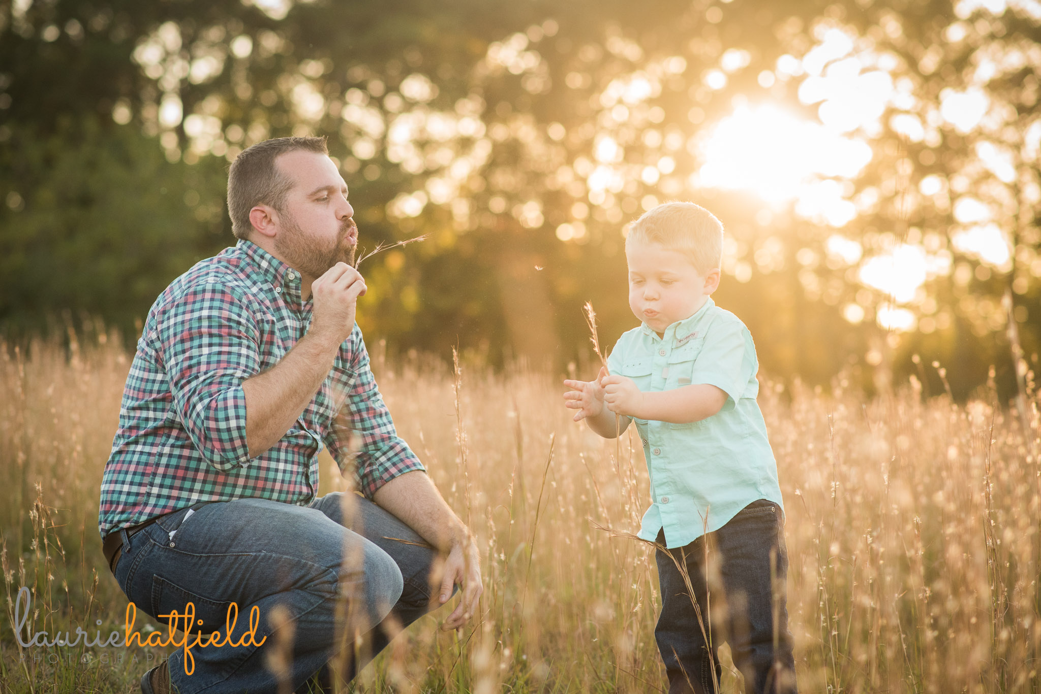 dad blowing dandelions with 3-year-old son | Mobile AL family photographer