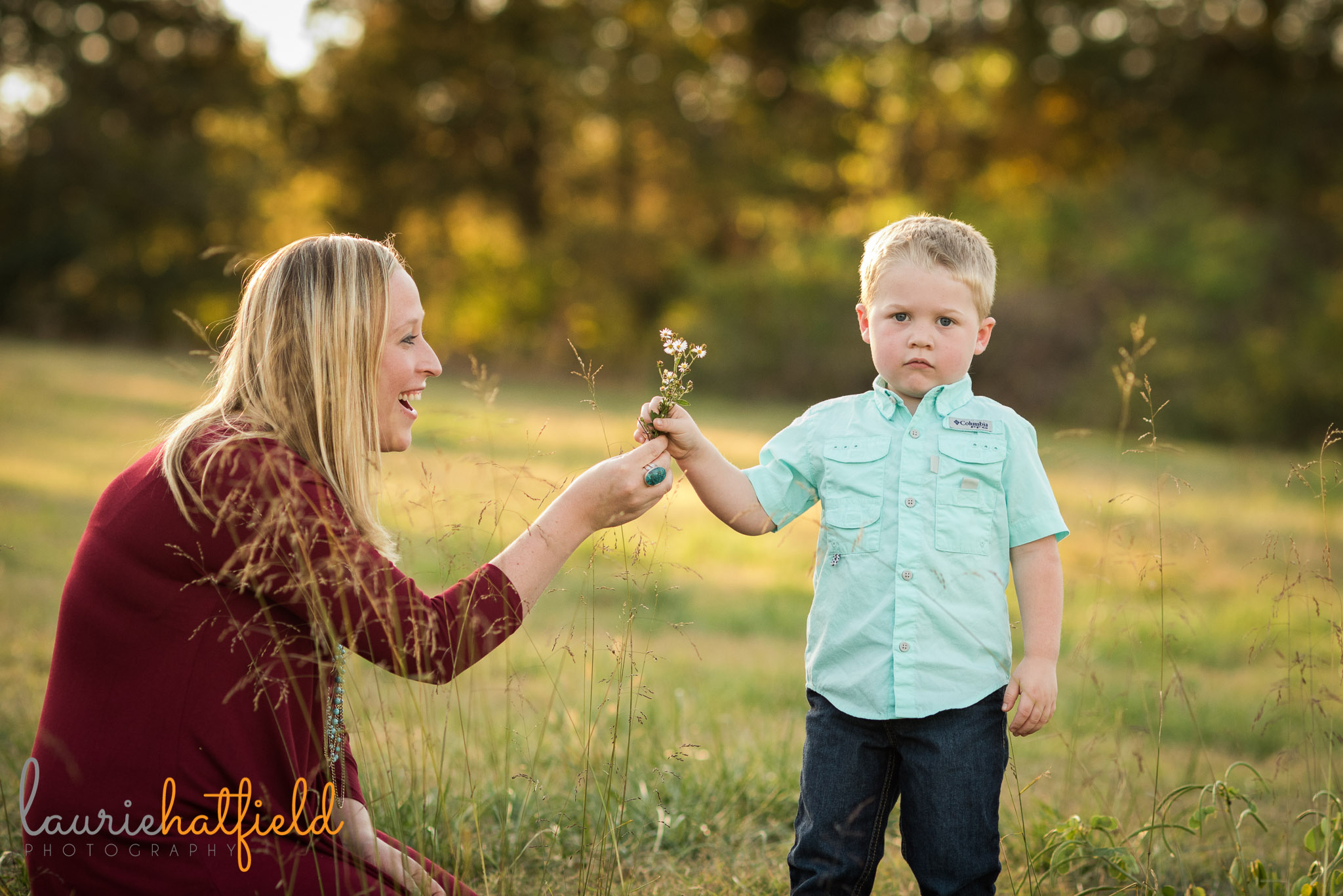mom and little boy in field | Mobile AL family lifestyle photographer