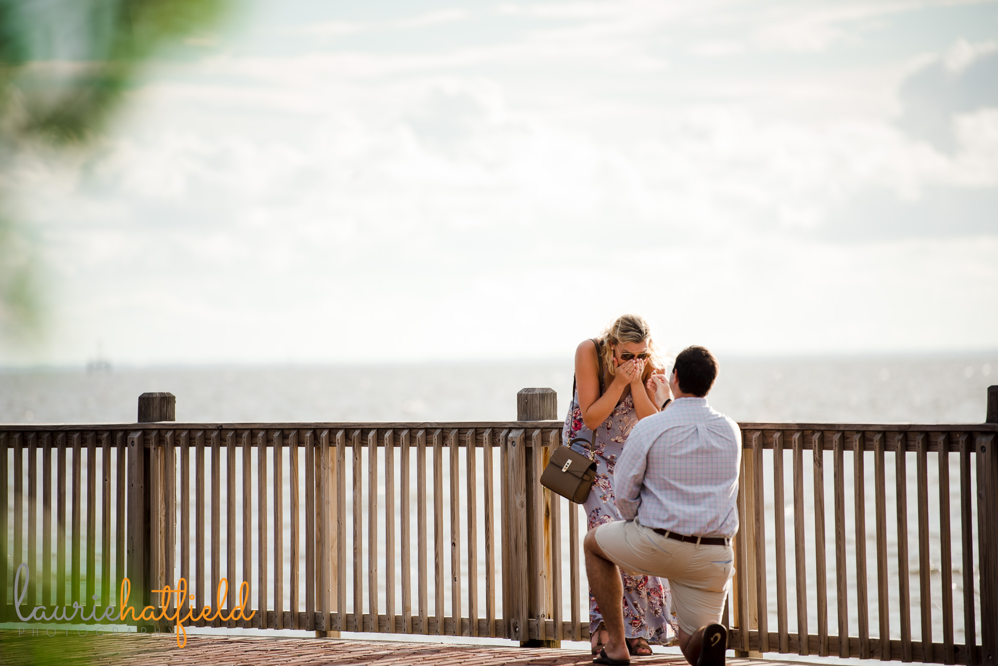 boy proposing near water | Mobile AL proposal photographer