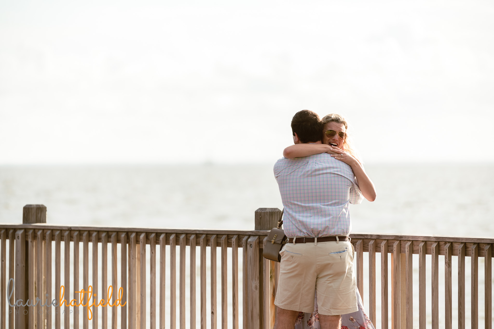 couple hugging after engagement | Mobile Al proposal photography