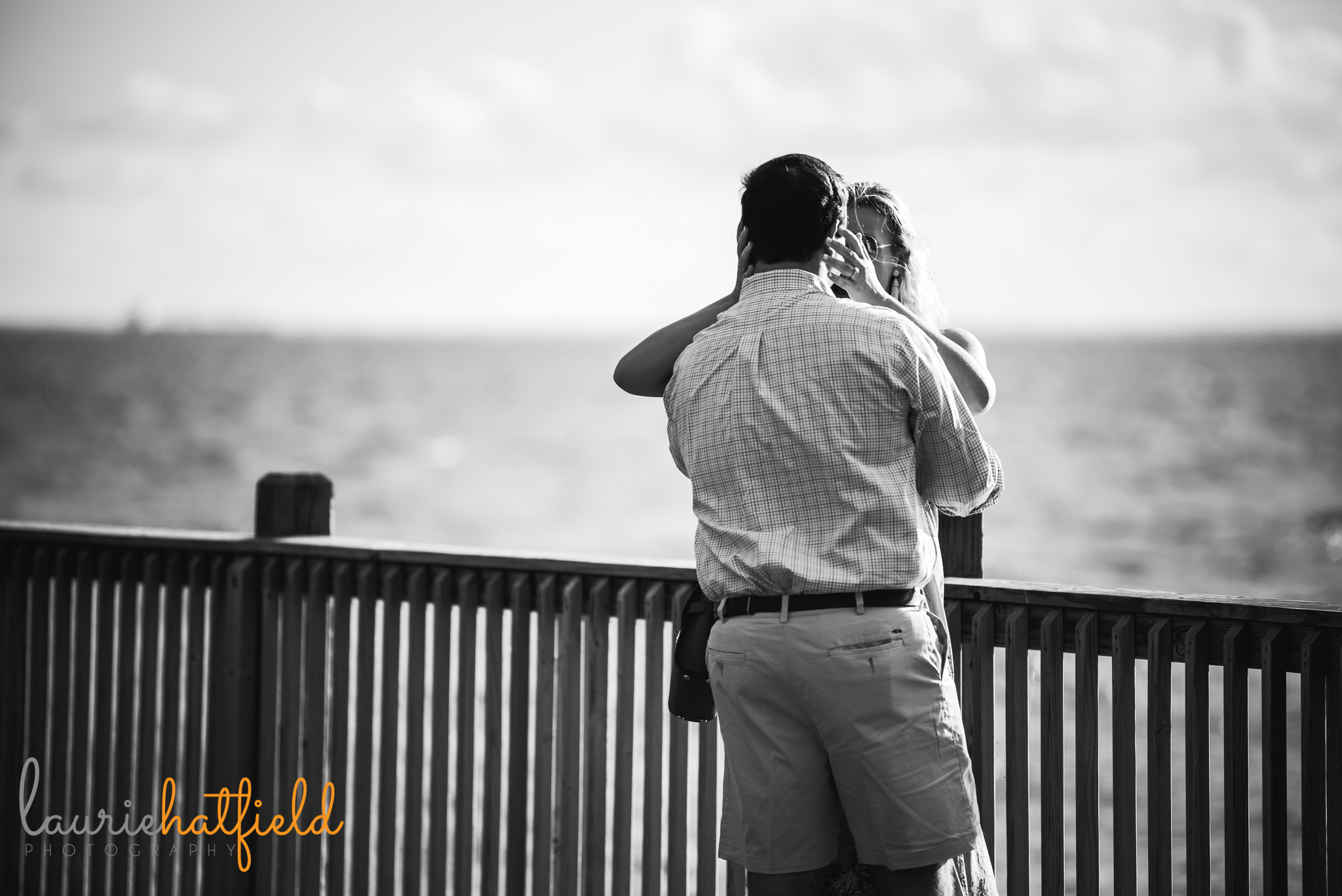 couple embracing after engagement | Mobile AL proposal photographer