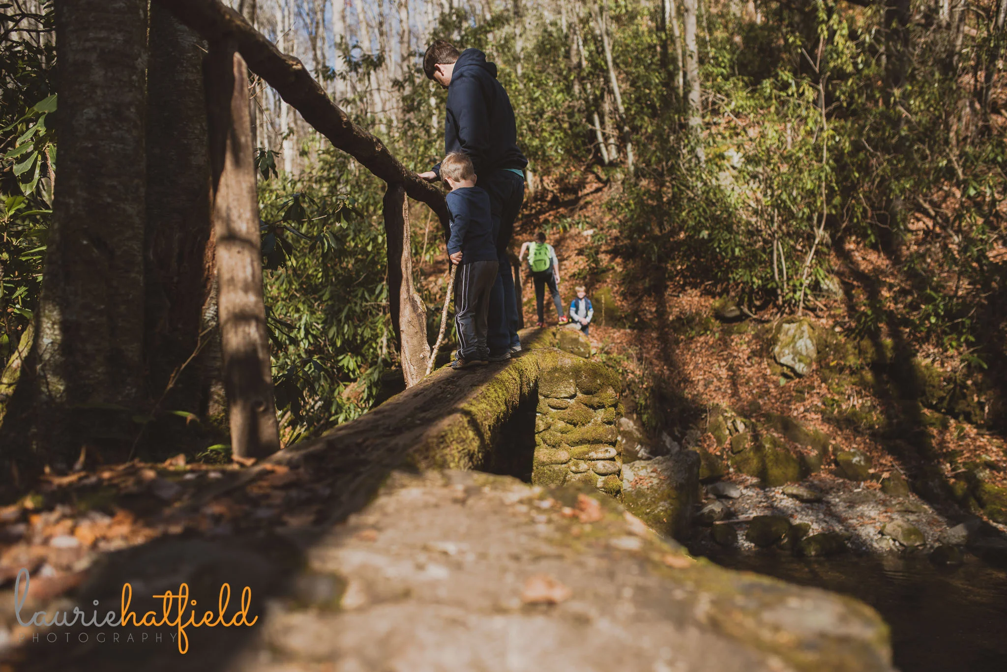 dad and son crossing bridge | Mobile AL family photographer