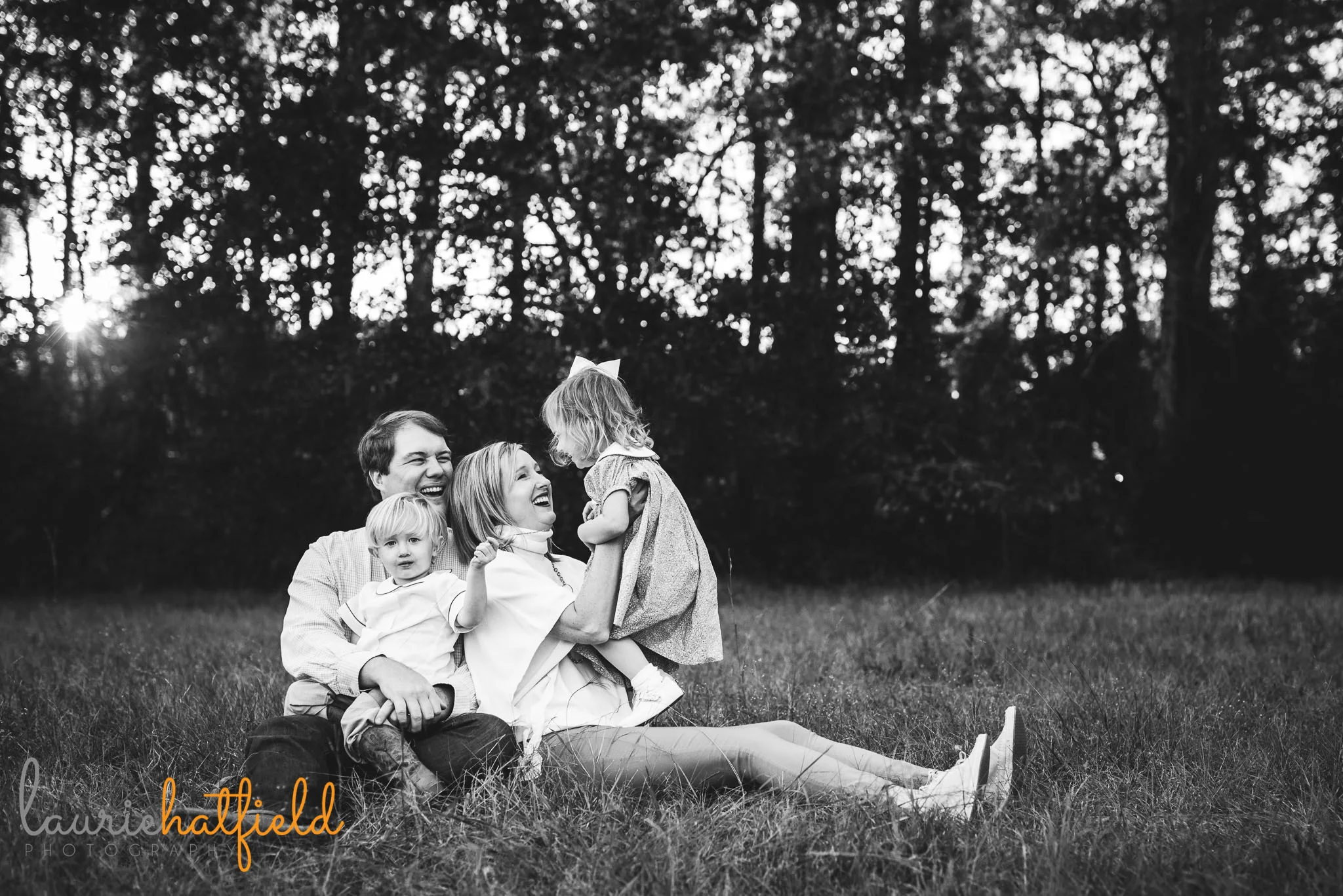 family of four in field | Pensacola FL lifestyle photographer
