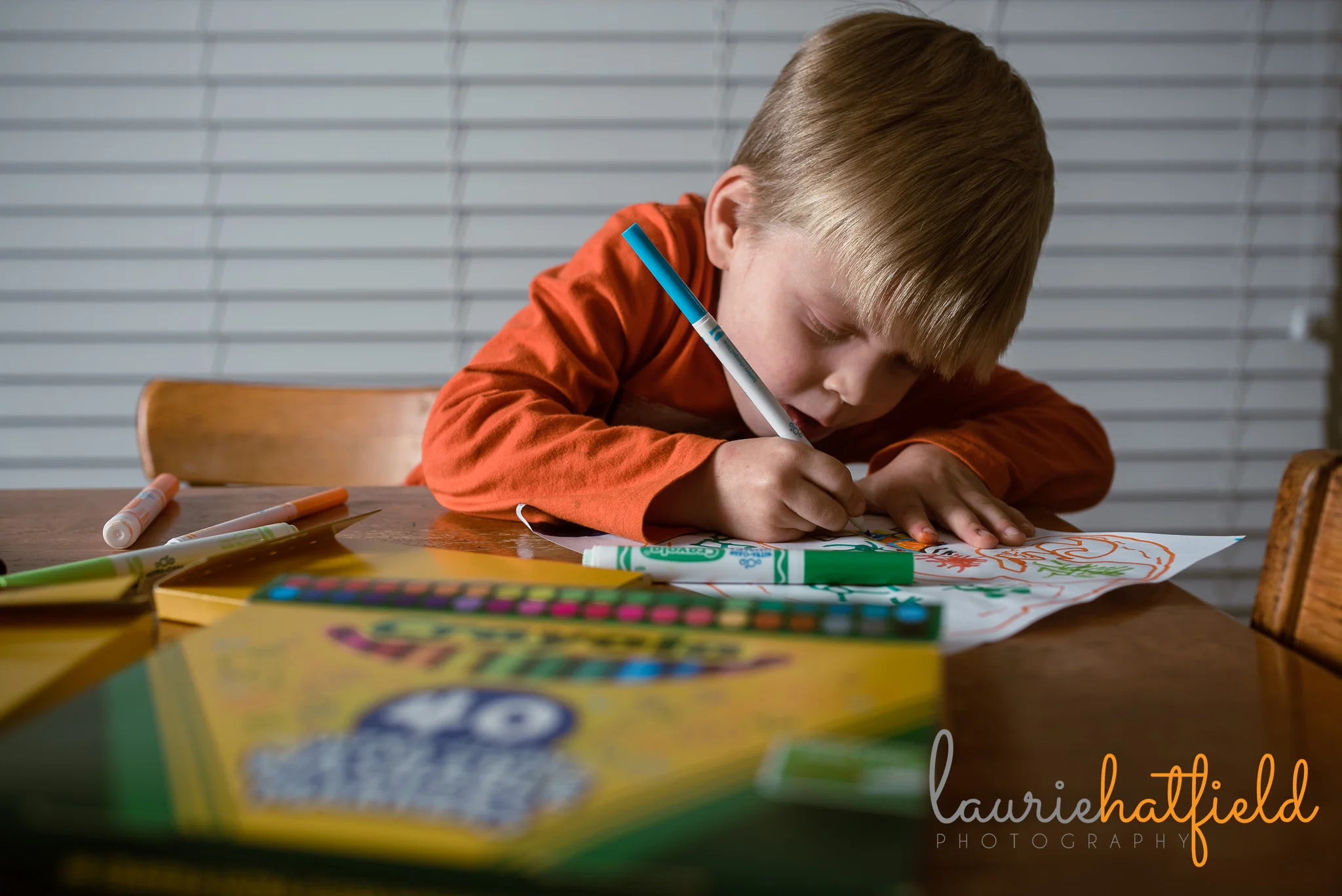 little boy coloring at table | Mobile AL family photographer