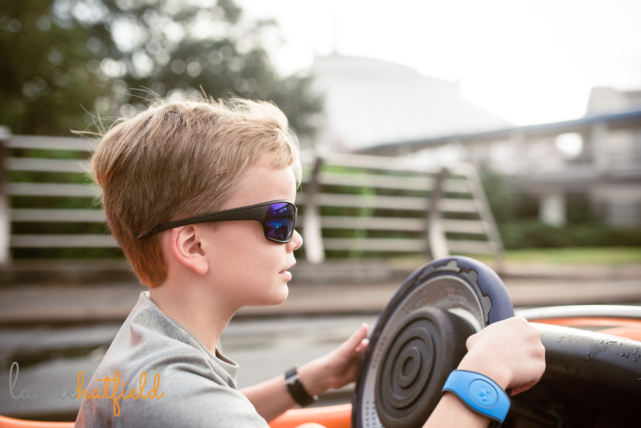 8-year-old driving at Tomorrowland Speedway | Mobile AL family photographer