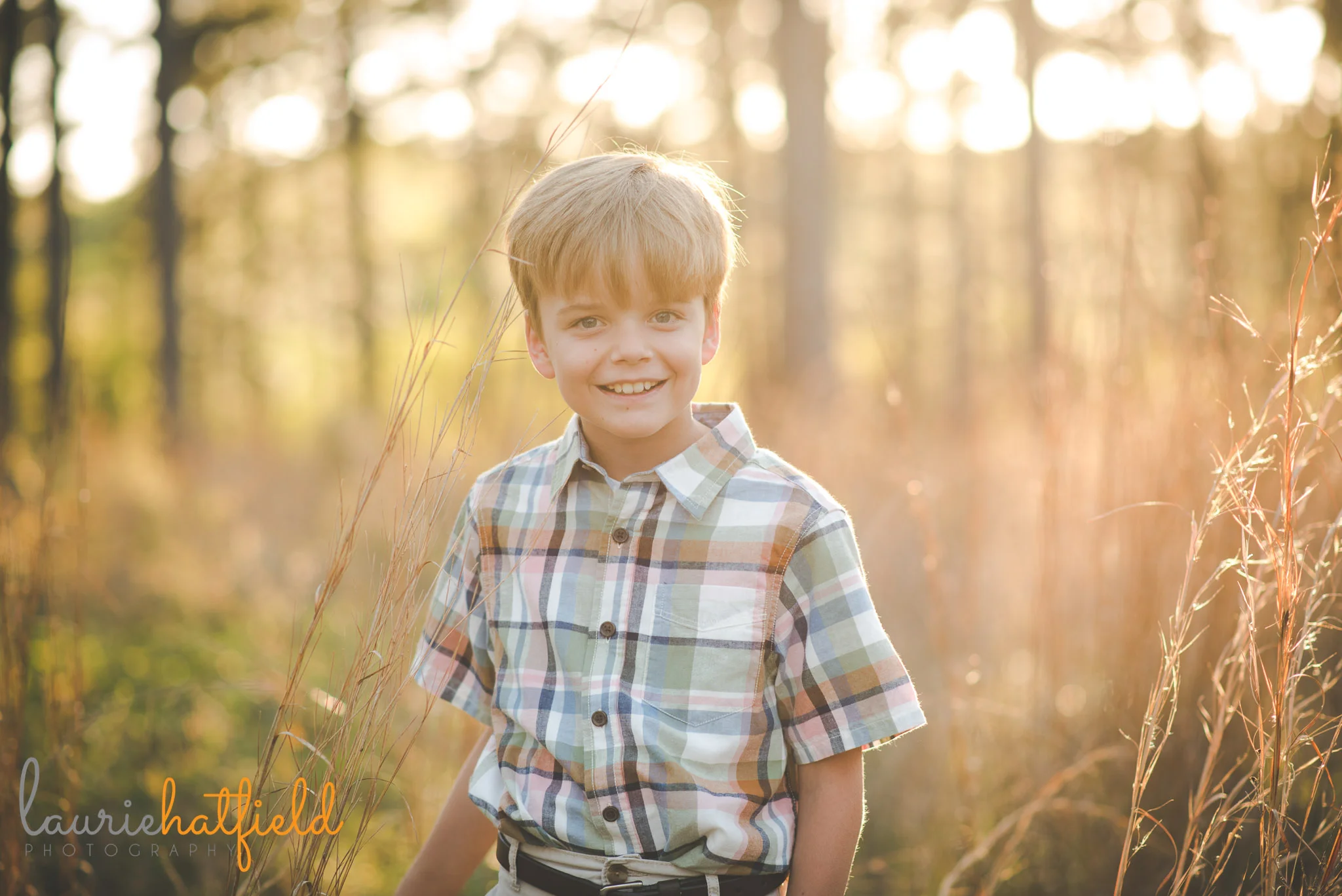 8-year-old boy portrait in field | Fairhope AL family photographer