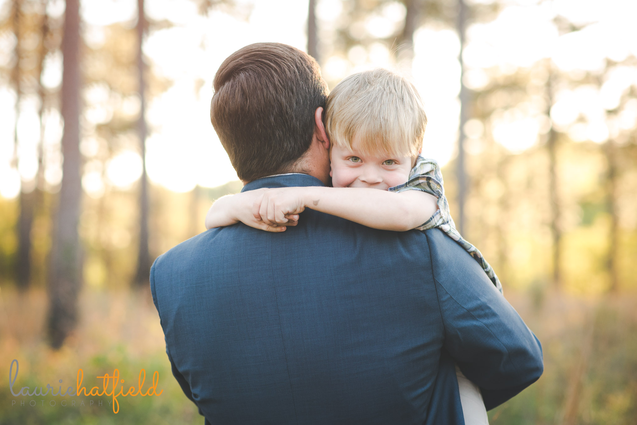 little boy in dad's arms | Mobile AL family photographer