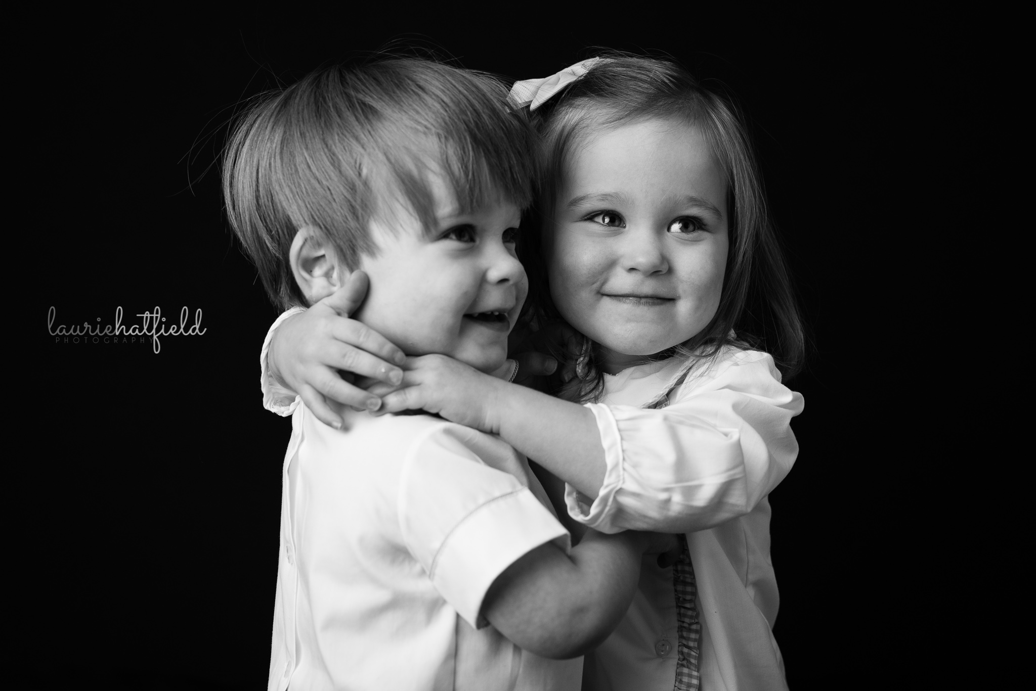 twin boy and girl hugging | Mobile AL preschool photographer