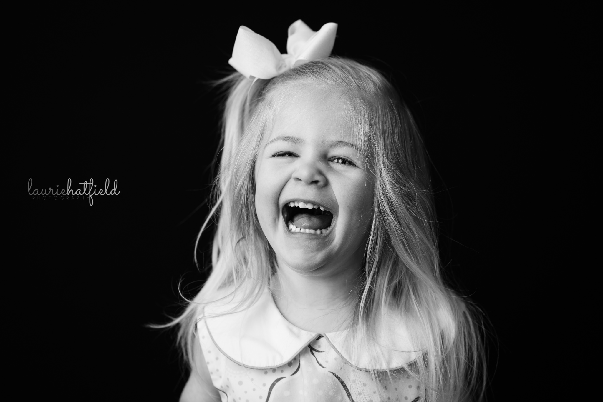 little girl laughing | Mobile AL school photographer