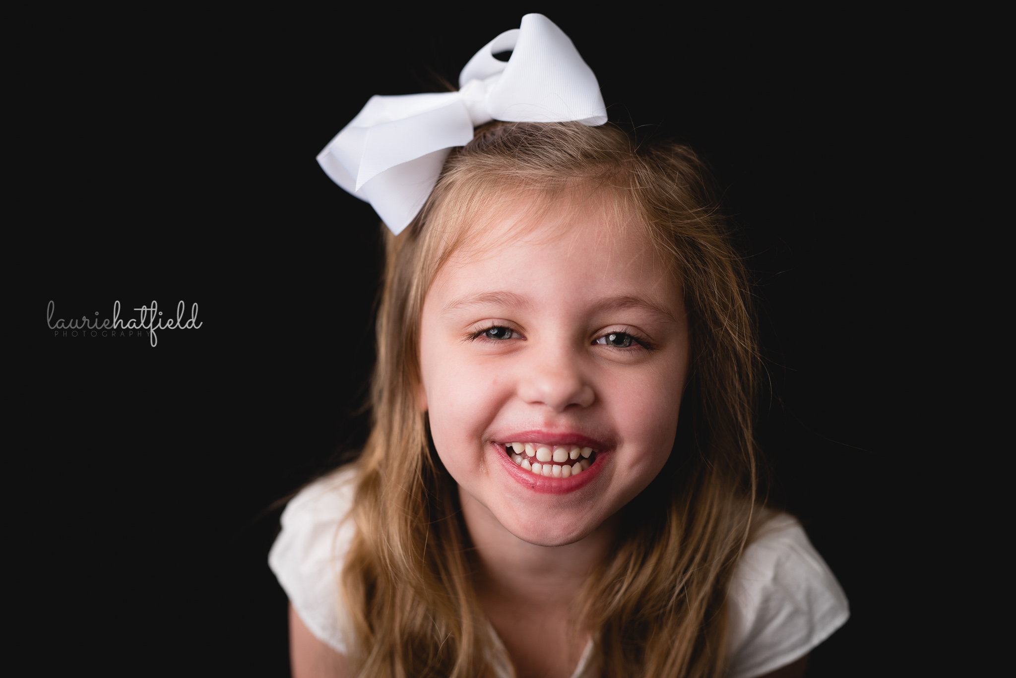 4-year-old girl laughing | Mobile AL school photography