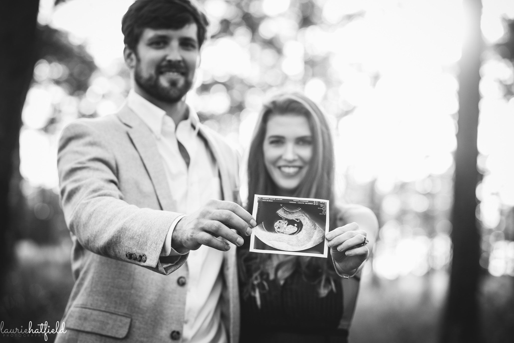 couple with ultrasound picture | Mobile AL newborn photographer