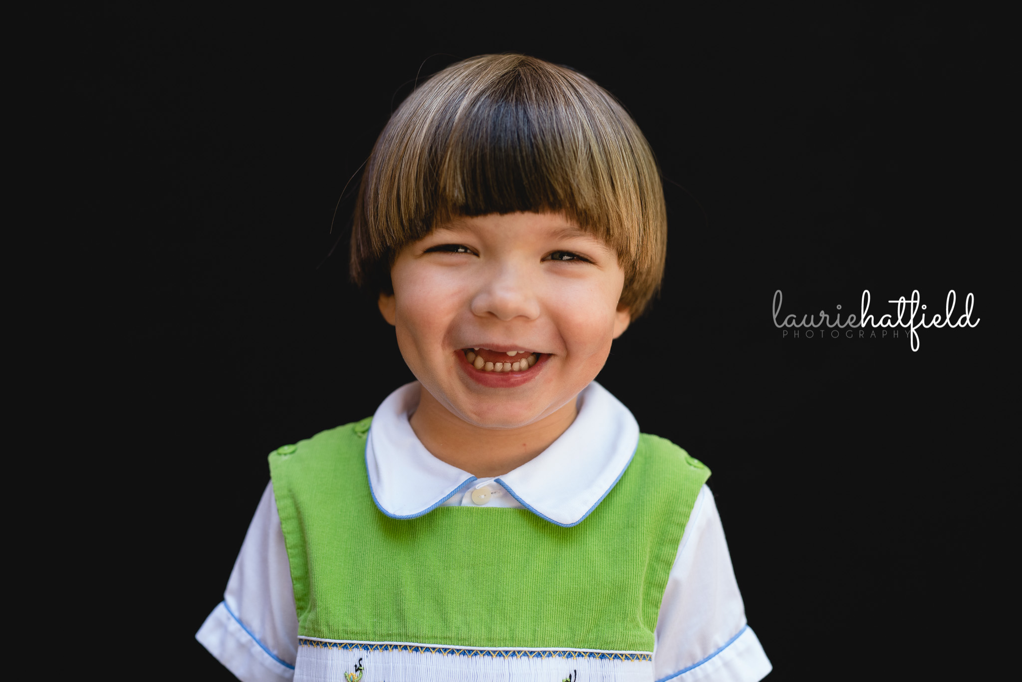 preschool boy in green jon jon | Mobile AL school portraits