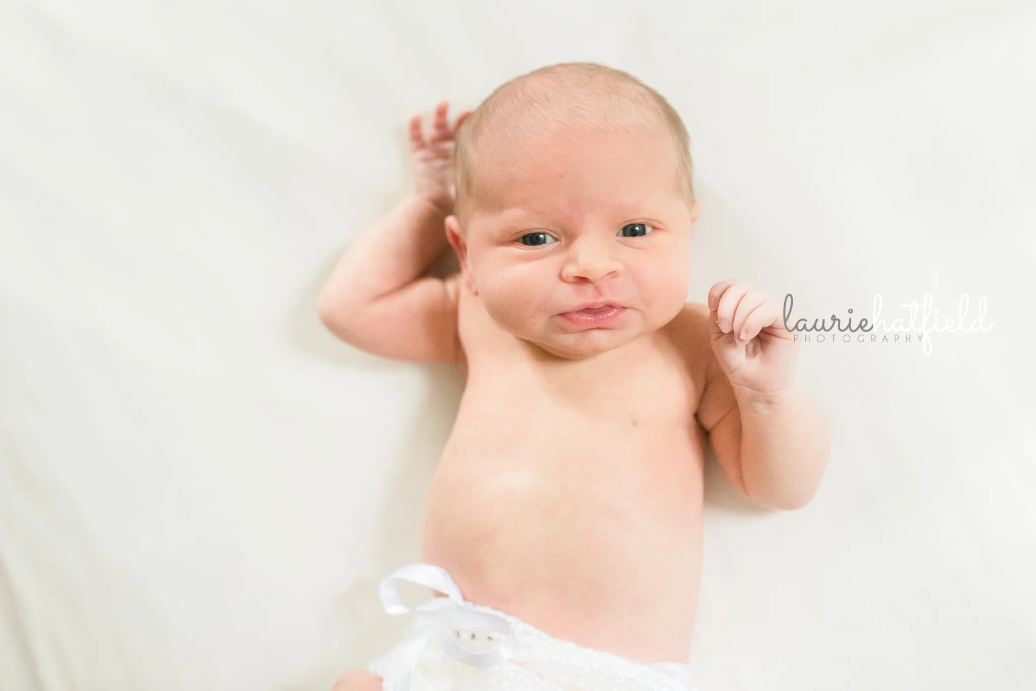 baby girl on white | Mobile AL newborn photographer