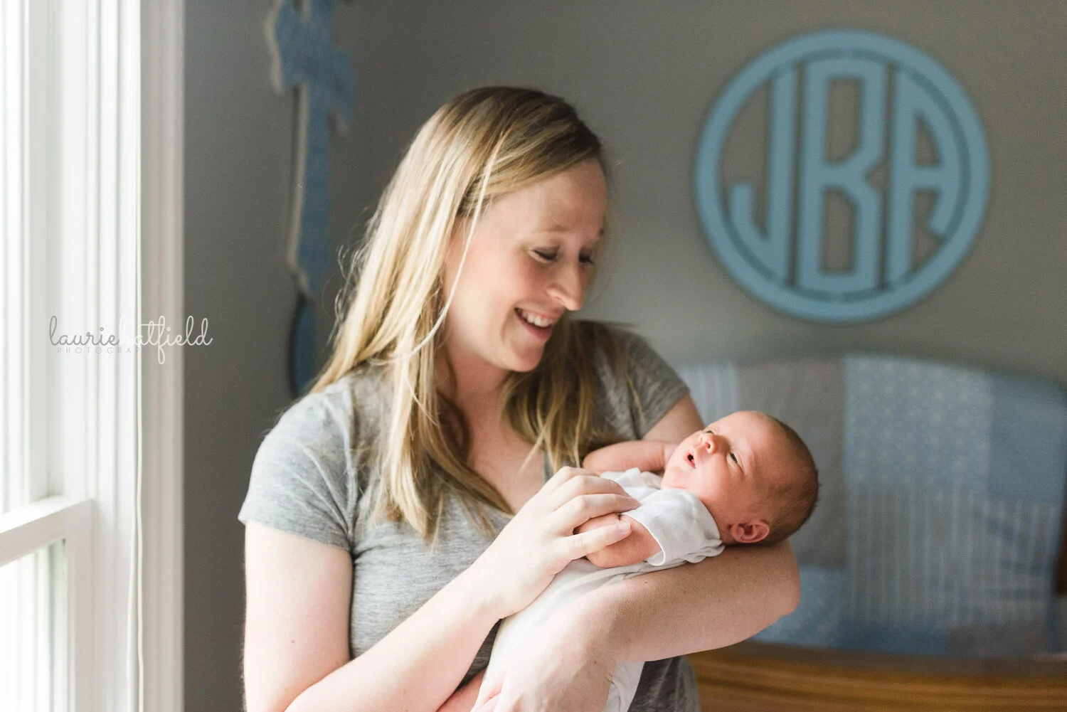mom holding baby boy | Huntsville AL newborn photographer