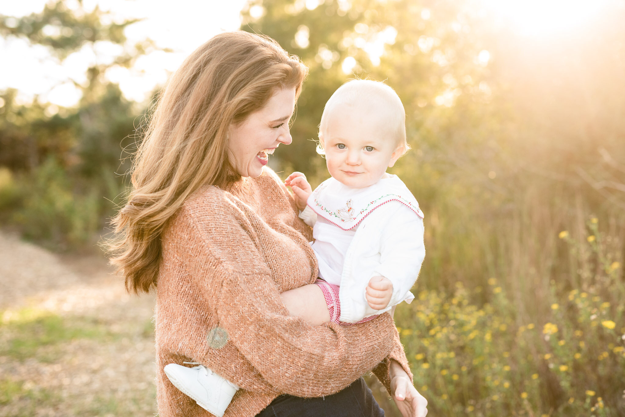 mom holding baby boy | Madison AL family pictures