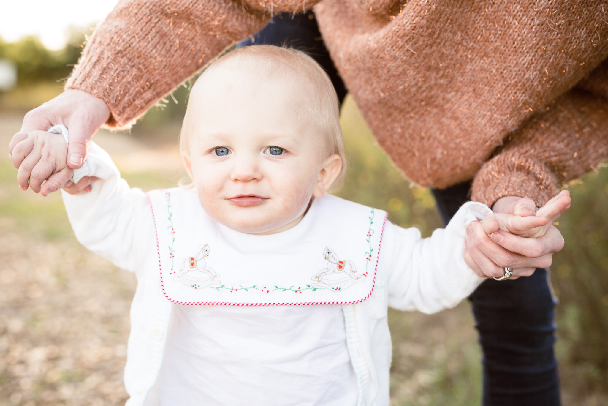 baby boy holding mom's hand | Athens AL family photographer