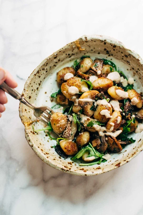 Mushroom Gnocchi with Arugula and Walnut Pesto