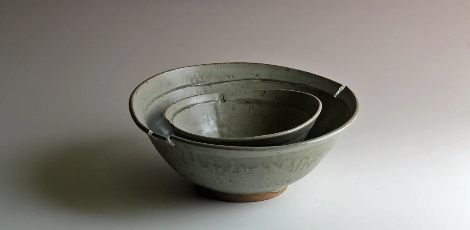 nesting stoneware bowls with ash glaze