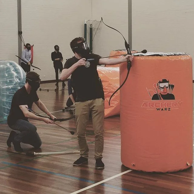 Taking aim at his colleagues #officeparty #christmasparty #festiveseason #archerywarz #melbourne #melbournefun #melbournetodo #melbourneeats #melbourneattractions #melbourneiloveyou #carlton #carltonbaths #ymca #ymcamelbourne