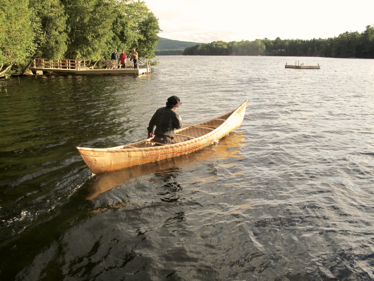 DMB in canoe with onlookers (edited).jpg