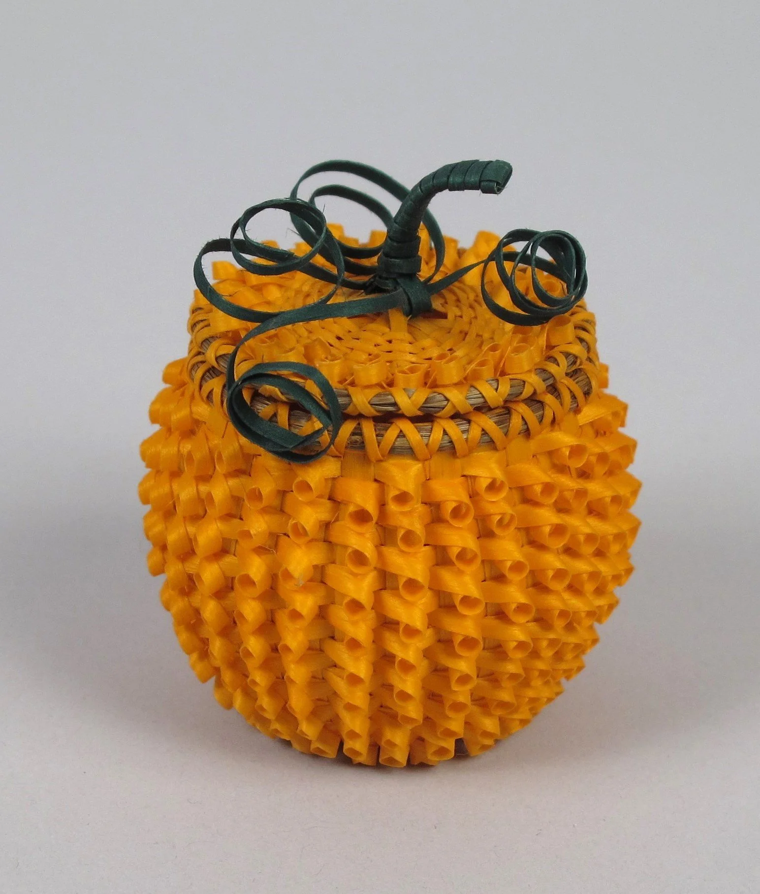    Pumpkin basket  , 2014 by Ganessa Bryant Frey (Penobscot, b. 1982), Ash sweetgrass, and commercial dyes (2014-08-001 A-B) 