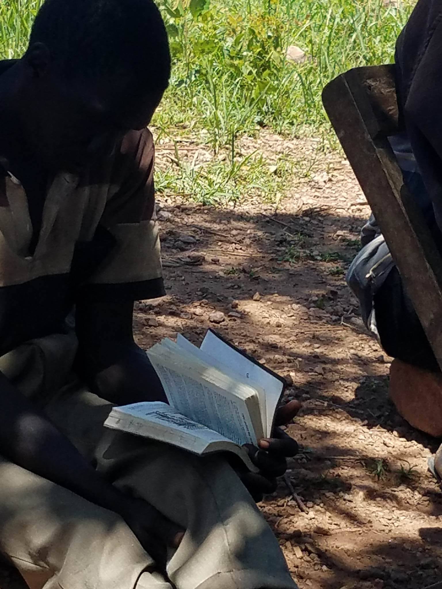 Bible reading Ugandan fb.jpg