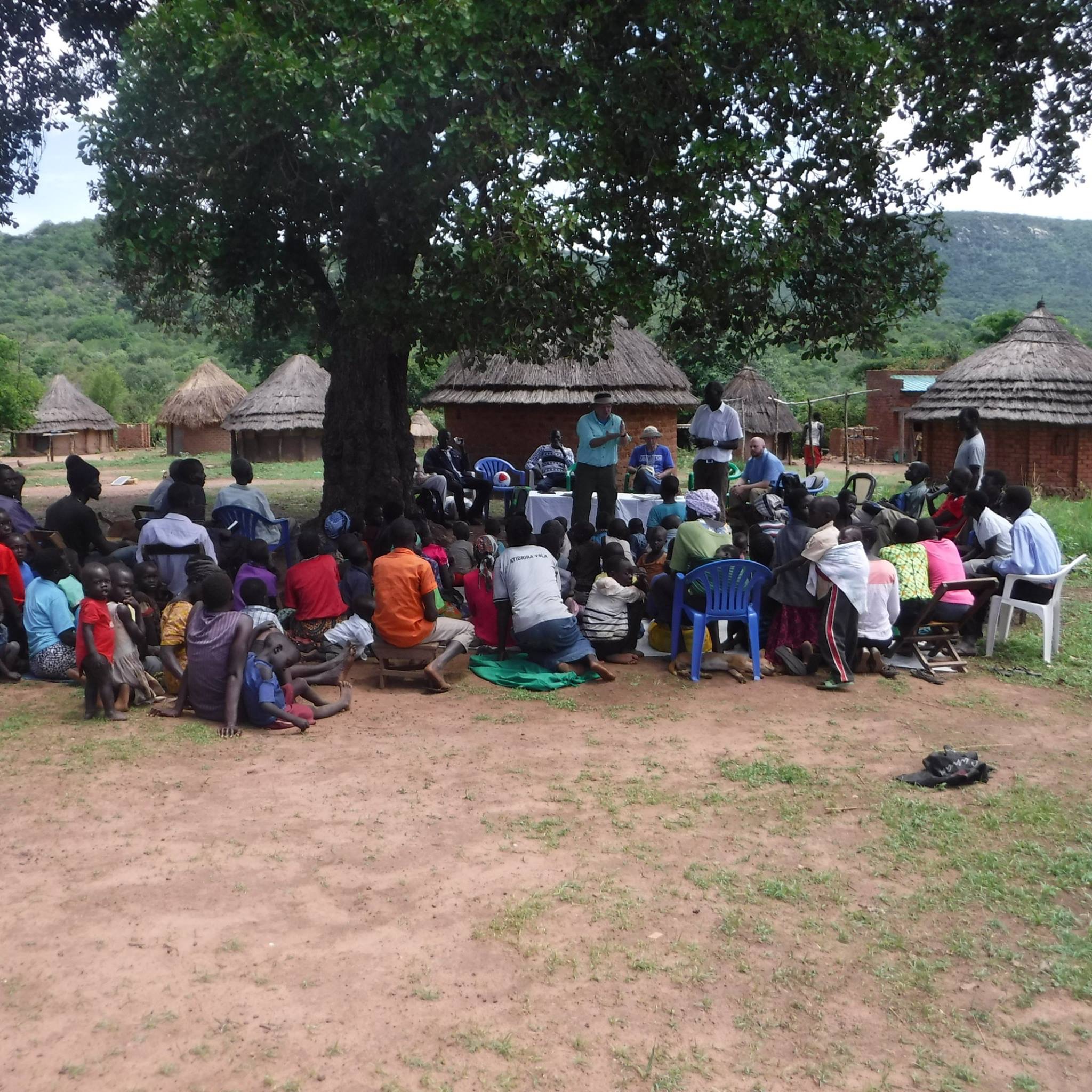 Ugandans listening to preaching Jacon Lee FB Moyo 5.4.17.JPG