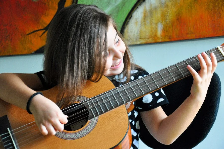 Guitar lessons help improve coordination and balance