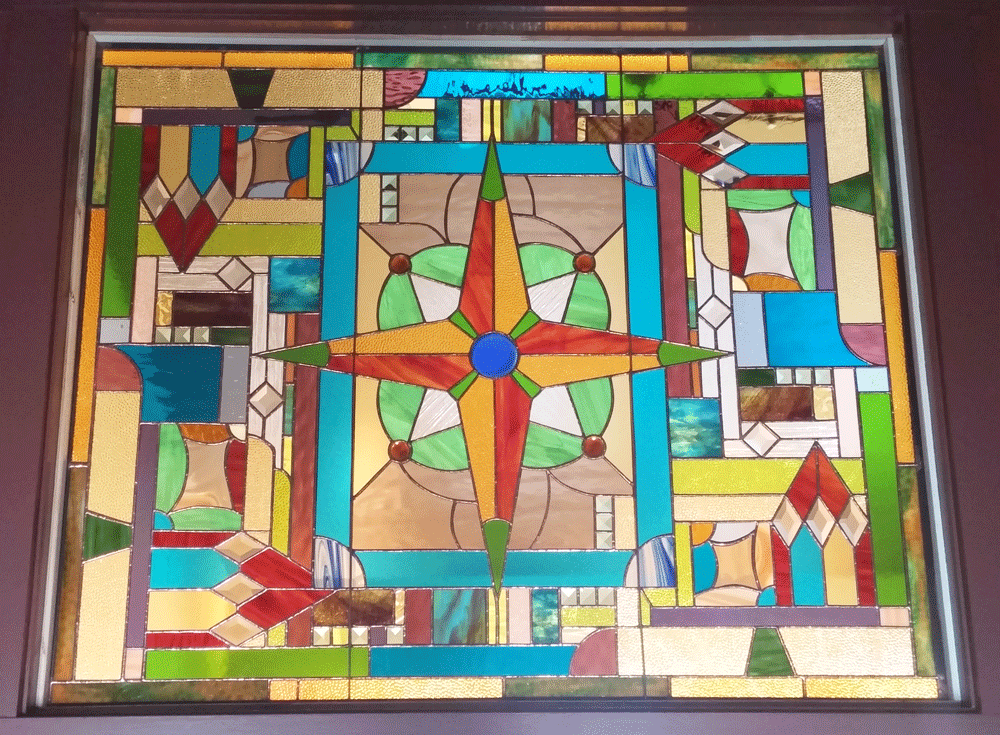 Gary Medley, Compass , 2016, stained glass, copper foil, zinc, 60/40 solder, 38" x 43"