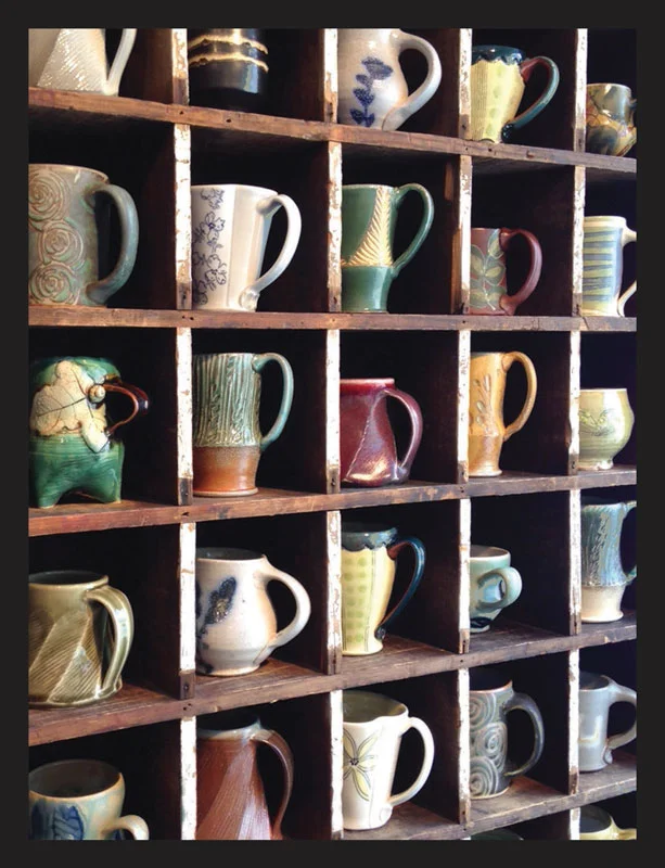 A selection of handmade mugs from local & regional potters in our mug cubby (Lark & Key Gallery)