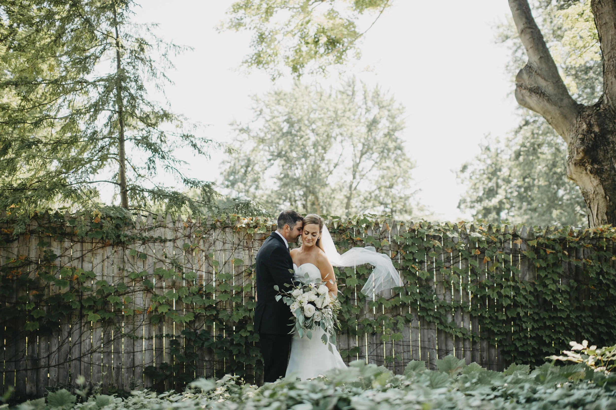 Erin and Matt and the wedding crasher : wedding photographer Buffalo NY