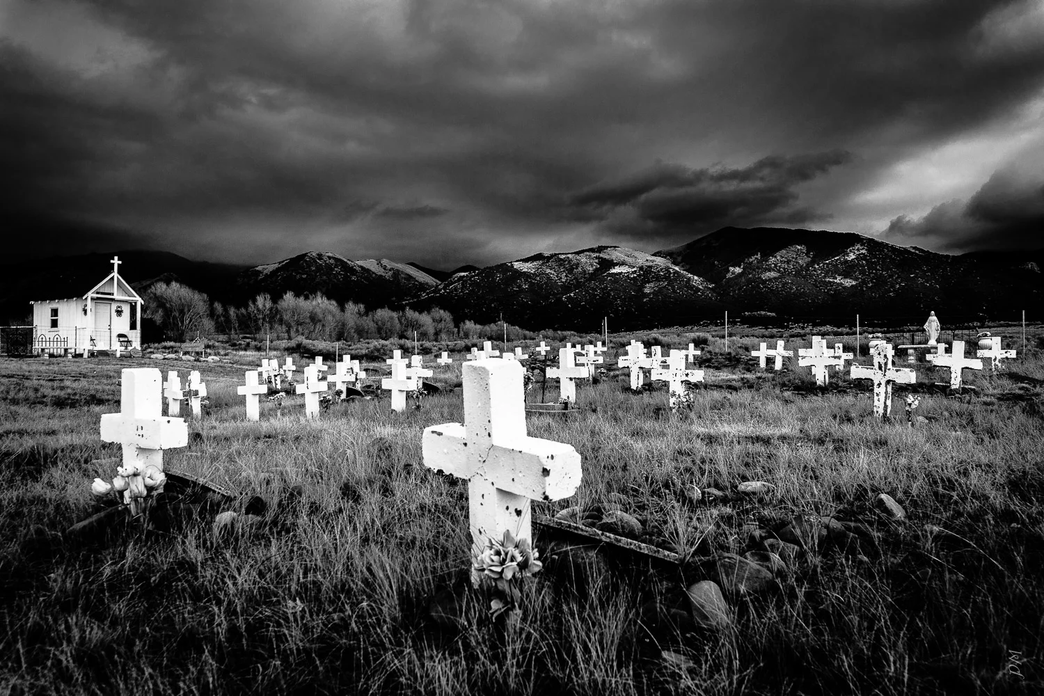 Found this very remote cemetery in the San Luis Valley, Colorado after a storm - really struck me for a visual mood.
