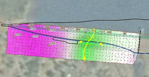 The above 2-D map shows preliminary interpretation of subsurface water seepage pathways (yellow lines) of dam seepage.